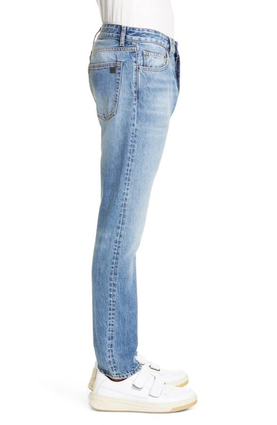 Shop Palm Angels Needled Logo Jeans In Light Wash