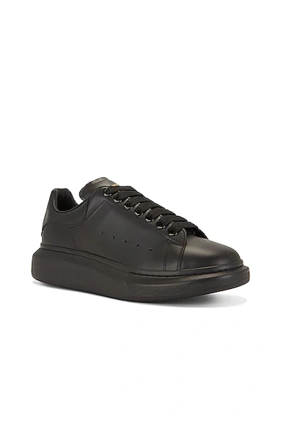 Shop Alexander Mcqueen Leather Sneaker In Black