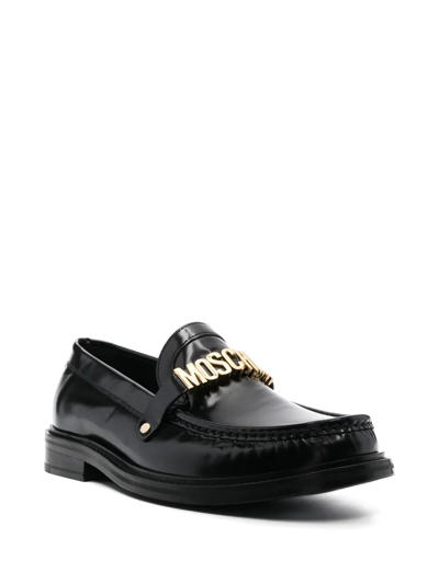 Shop Moschino Logo-plaque Leather Loafers In Black