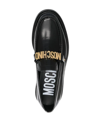 Shop Moschino Logo-plaque Leather Loafers In Black