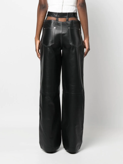 Shop Manokhi Wide Cut-out Leather Trousers In Black