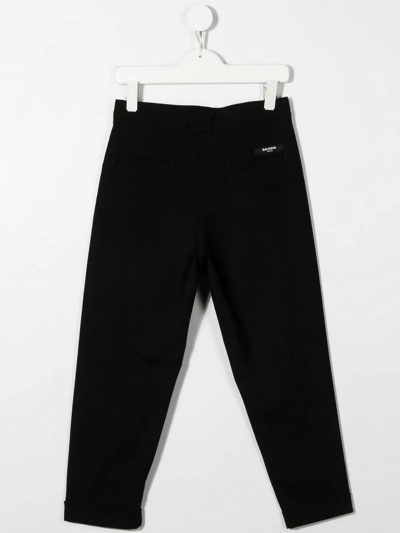 Shop Balmain High-waisted Virgin-wool Trousers In Black