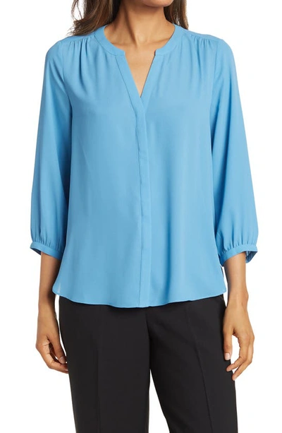 Shop Nydj High/low Crepe Blouse In Parisian Blue