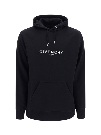 Shop Givenchy Logo Reverse Drawstring Hoodie In Black