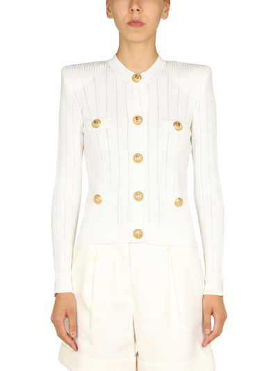 Shop Balmain Embossed Buttons Cardigan In White