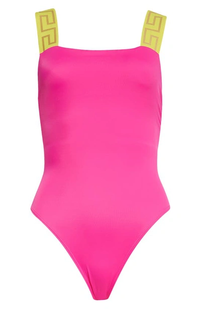 Shop Versace Greca Strap One-piece Swimsuit In Fuchsia Yellow