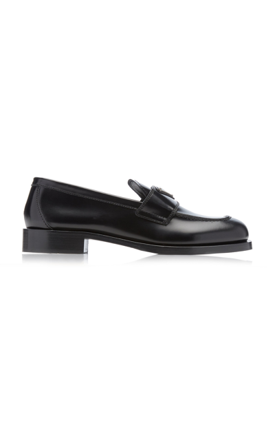 Shop Prada Leather Loafers In Black