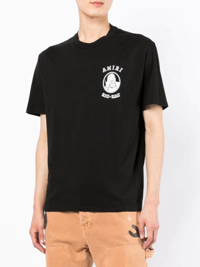 Shop Amiri Graphic-print Cotton T-shirt In Schwarz