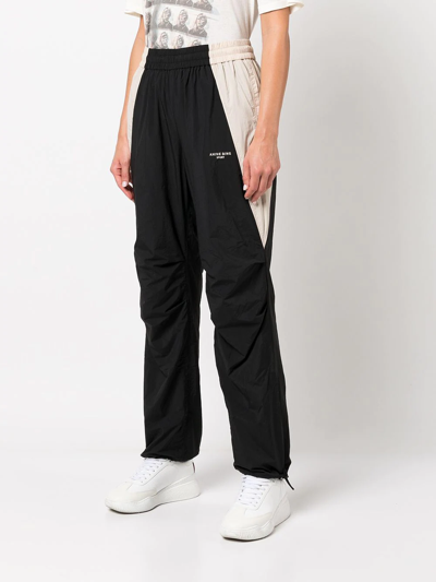 Shop Anine Bing Emerson Contrasting-panel Trousers In Black