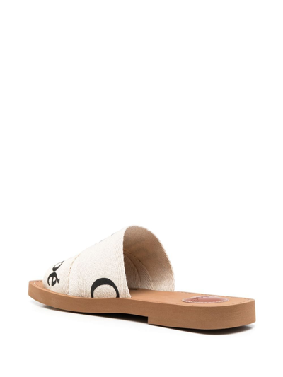 Shop Chloé Logo Print Slides In White