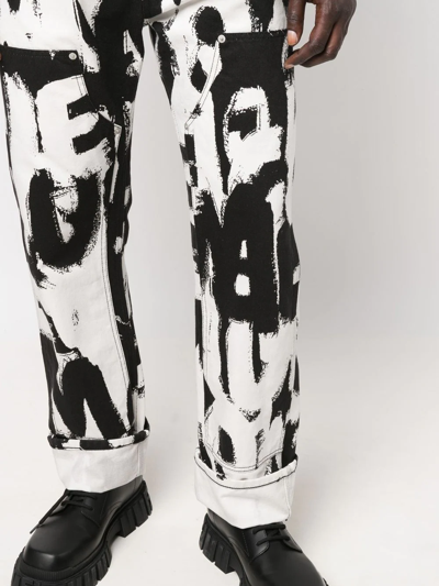 Shop Alexander Mcqueen Graffiti-print Straight-leg Jeans In White