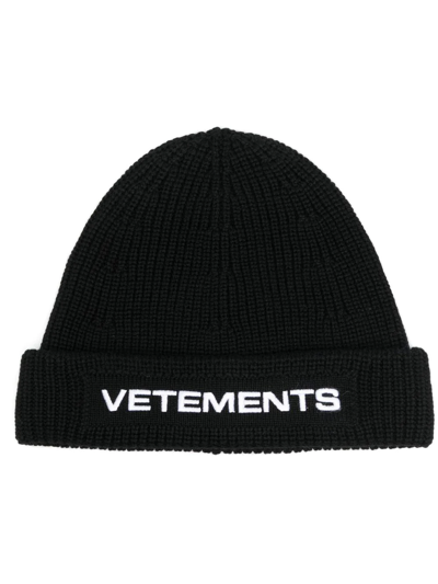Shop Vetements Logo-embroidered Rib-knit Beanie In Black