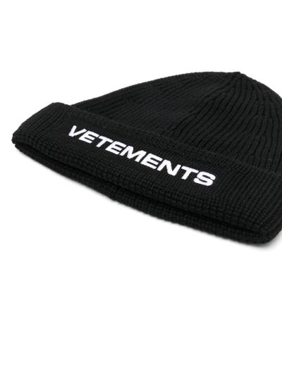 Shop Vetements Logo-embroidered Rib-knit Beanie In Black