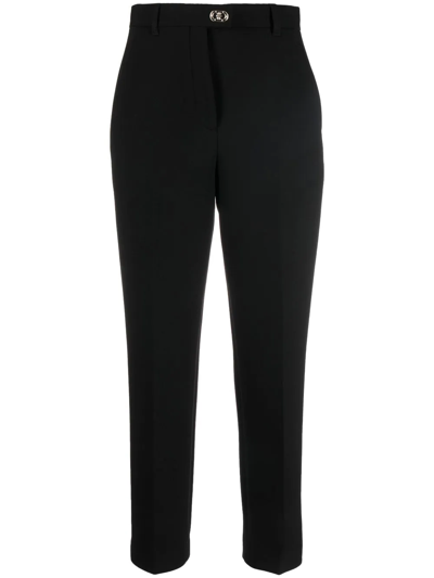 Shop Ferragamo Cropped Tapered Trousers In Black