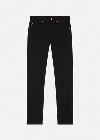 Shop Versace Slim-fit Jeans In Black