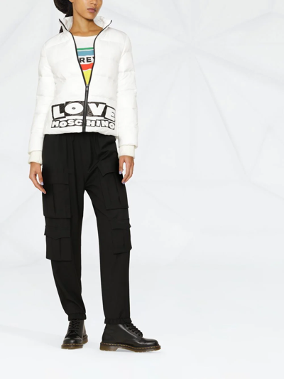 Shop Love Moschino Logo Print Quilted Puffer Jacket In White