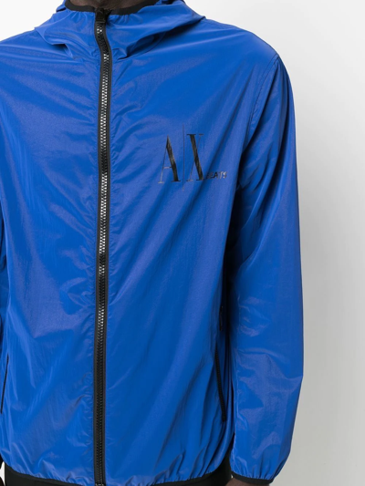 Shop Armani Exchange Logo-print Hooded Lightweight Jacket In Blue