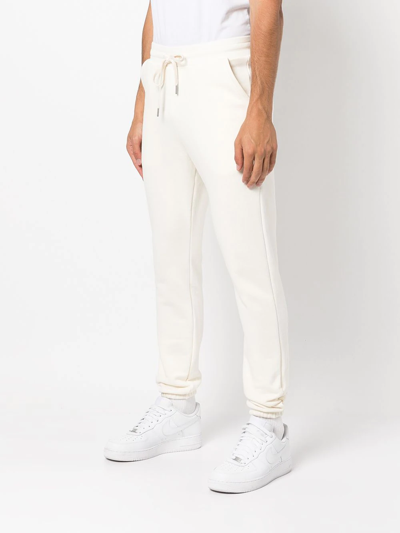 Shop John Elliott Drawstring Slim-fit Joggers In White