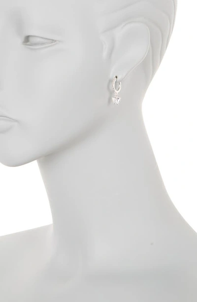 Shop Dkny Butterfly Drop Pavé Huggie Hoop Earrings In Silver/ Crystal