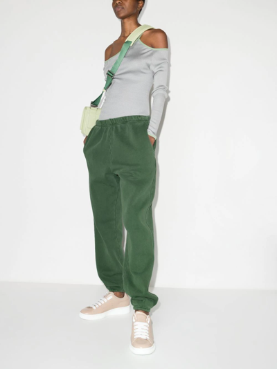 Shop Les Tien Faded-effect Track Pants In Green