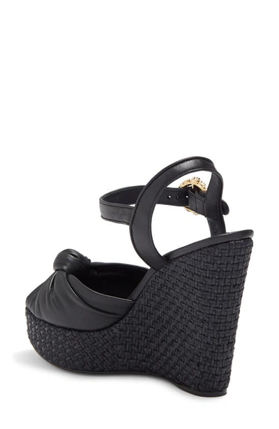 Shop Dolce & Gabbana Knot Embellished Slingback Wedge Sandal In Black