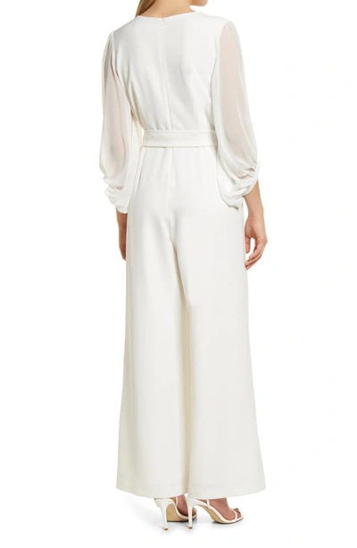 Shop Donna Ricco Long Sleeve Wrap Jumpsuit In Ivory