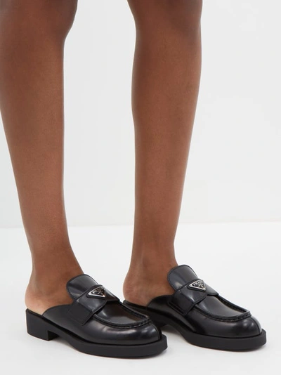 PRADA TRIANGLE LOGO-PLAQUE LEATHER BACKLESS LOAFERS 