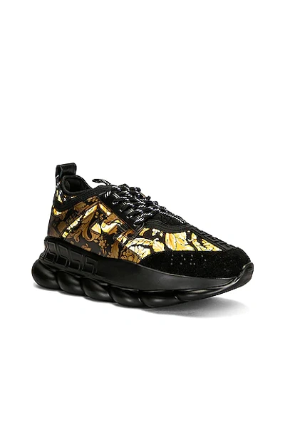 Shop Versace Chain Reaction Sneaker In Oro & Nero