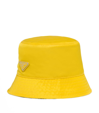 Shop Prada Re-nylon Bucket Hat In Yellow
