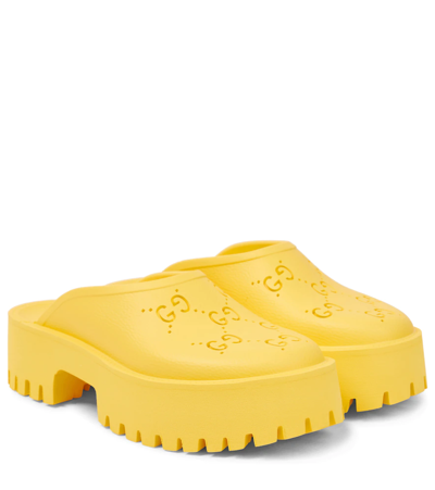 Shop Gucci Gg Rubber Clogs In Smile Yellow