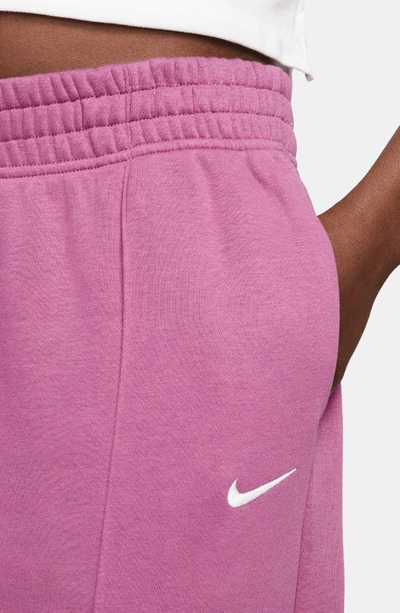 Shop Nike Sportswear Essential Fleece Pants In Light Bordeaux/ White