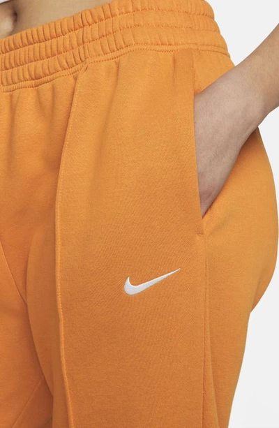 Shop Nike Sportswear Essential Fleece Pants In Light Curry/ White