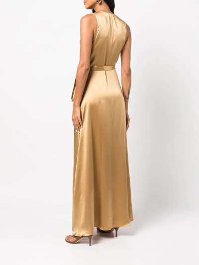 Shop Voz Silk Maxi Wrap Dress In Gold