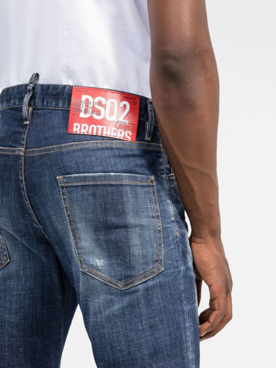 Shop Dsquared2 Bleached Slim-fit Jeans In Blau
