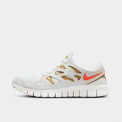 Shop Nike Women's Free Run 2 Running Shoes In Summit White/goldtone/sail/rush Orange