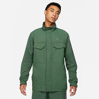 Shop Nike Men's Sportswear M65 Unlined Woven Jacket In Galactic Jade/galactic Jade