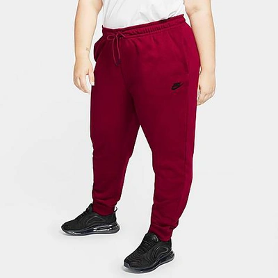 Shop Nike Women's Sportswear Essential Jogger Pants (plus Size) In Pomegranate/black