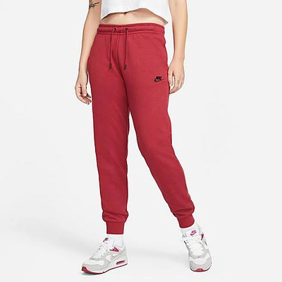 Shop Nike Women's Sportswear Essential Jogger Pants In Pomegranate/black