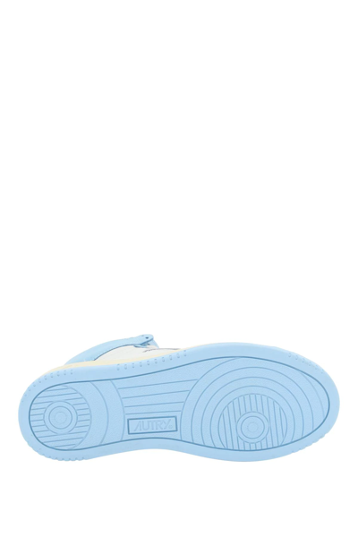 Shop Autry Medalist Mid Leather Sneakers In White,light Blue