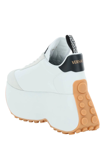 Shop Versace Triplatform Sneakers In White