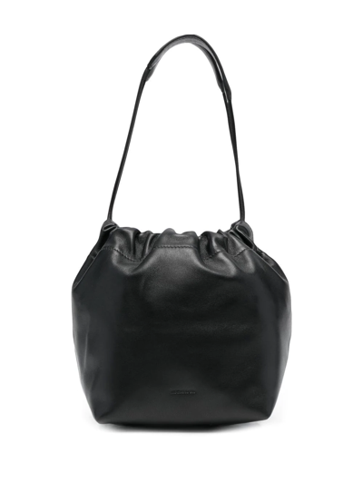 Shop Jil Sander Drawstring-fastening Shoulder Bag In Black