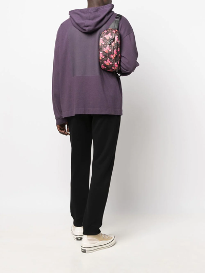 Shop Moschino Graphic-print Logo Belt Bag In Pink