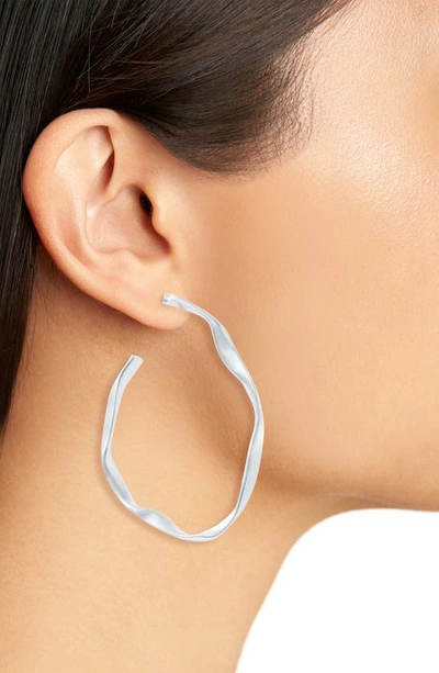 Shop Karine Sultan Irregular Hoop Earrings In Silver