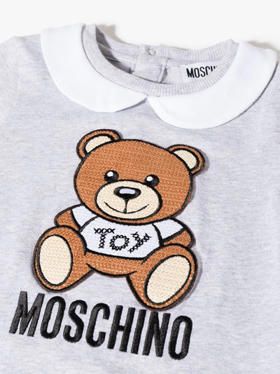 Shop Moschino Bear-motif Romper In Grey