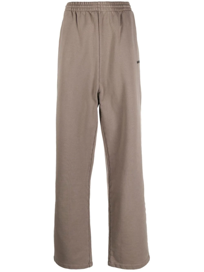 Shop Balenciaga Logo-embroidered Cotton Jogging Pants In Brown