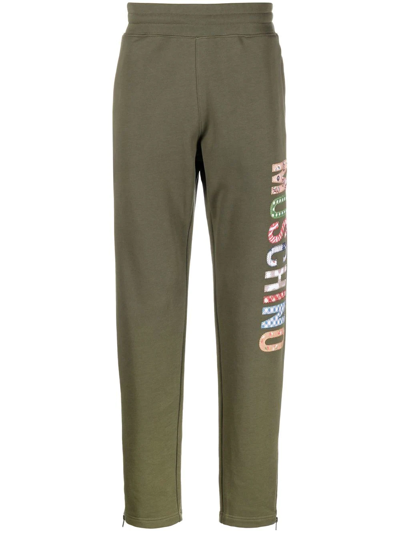 Shop Moschino Logo-print Track Pants In Green
