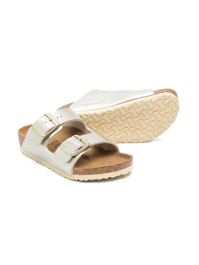 Shop Birkenstock Arizona Slip-on Sandals In Gold