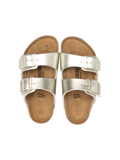 Shop Birkenstock Arizona Slip-on Sandals In Gold