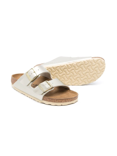 Shop Birkenstock Arizona Metallic Sandals In Gold