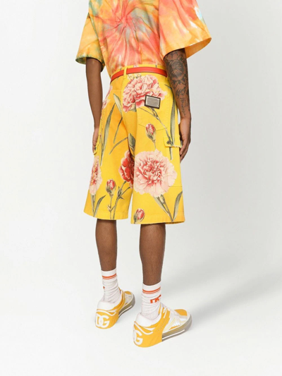 Shop Dolce & Gabbana Carnation-print Denim Shorts In Yellow
